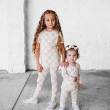 Ruffled Bamboo Zippy Sleeper in Salt + Sand Checkered