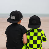 UPF50+ Boys Swim Romper in Neon Electric Lime + Black Checkered