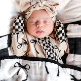 Ruffled Bamboo Zippy Sleeper in Lana (Bows)