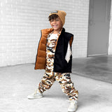 Reversible Puffer Vest in Rust + Black Corduroy