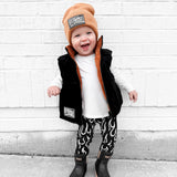 Reversible Puffer Vest in Rust + Black Corduroy