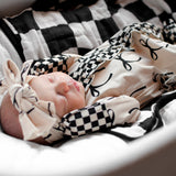 Ruffled Bamboo Zippy Sleeper in Lana (Bows)