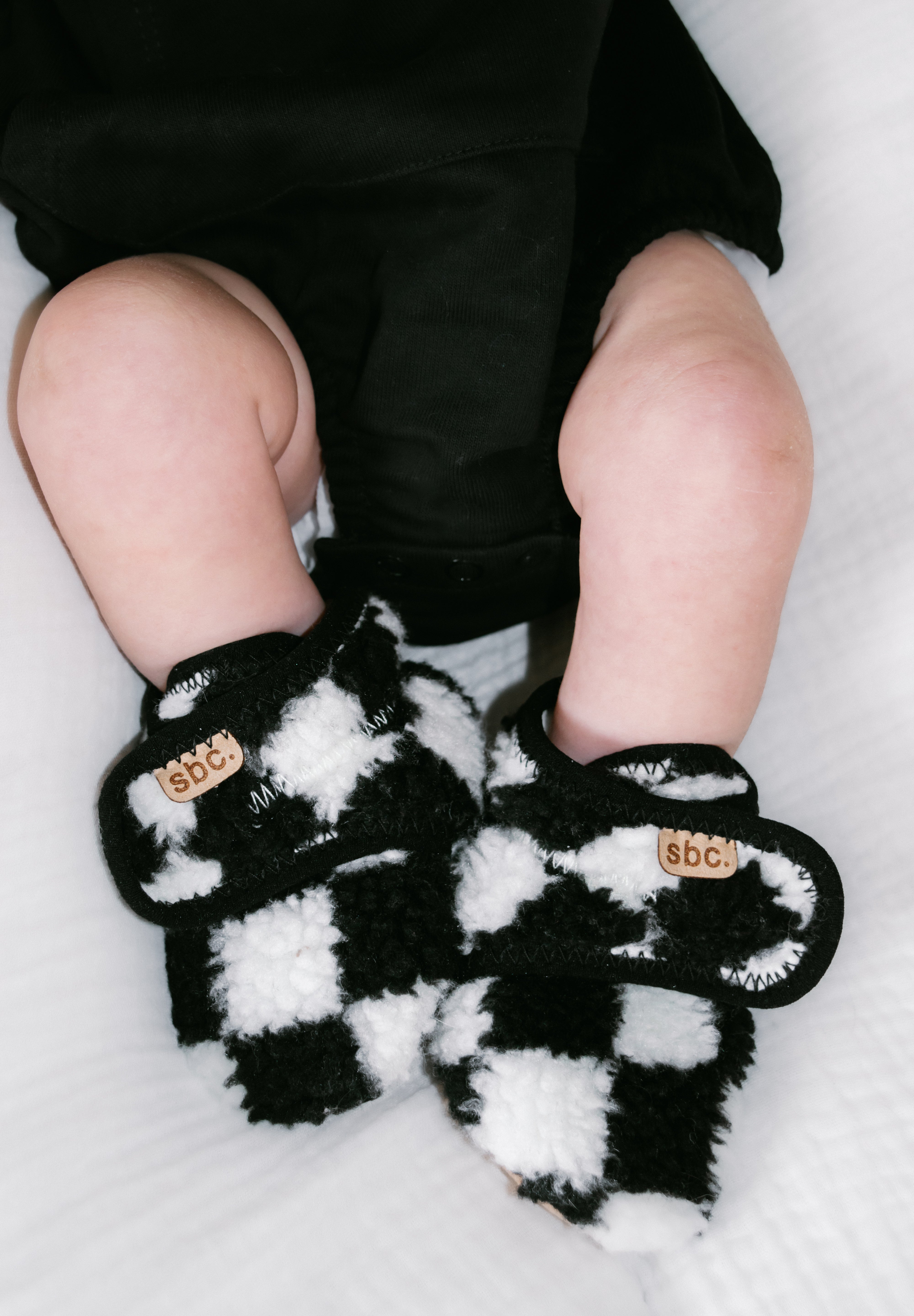 The Newborn Sherpa Bootie — Black + White Checkered - Rebel Bro