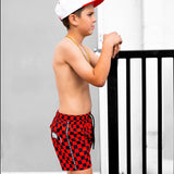 Hybrid Swim Trunks in Americana Red + Black Checkered